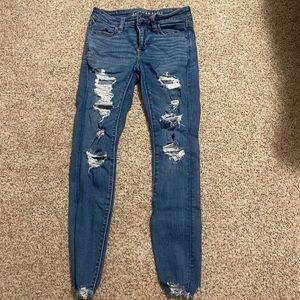 Medium wash American Eagle ripped skinny jeans, Size 2,